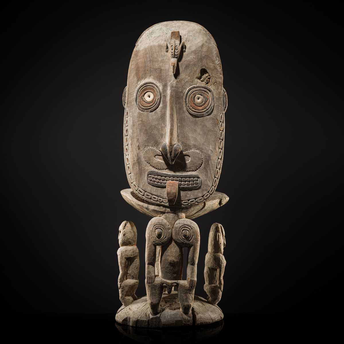 Lot 429 - A SHELL-INLAID IATMUL ORATOR’S STOOL (KAWA