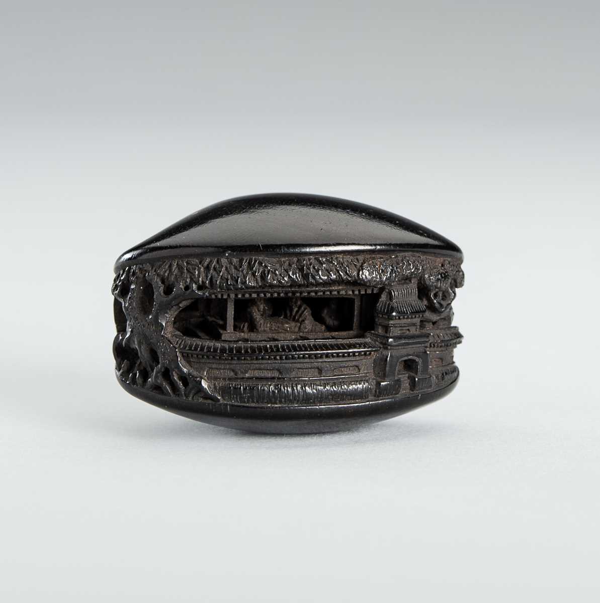Lot 345 - ITTO: A FINE ANABORI EBONY WOOD NETSUKE OF THE CLAM’S DREAM