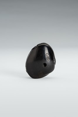 Lot 345 - ITTO: A FINE ANABORI EBONY WOOD NETSUKE OF THE CLAM’S DREAM