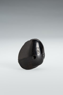 Lot 345 - ITTO: A FINE ANABORI EBONY WOOD NETSUKE OF THE CLAM’S DREAM