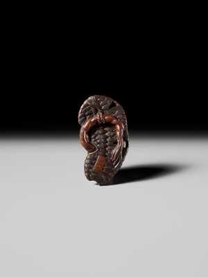 Lot 391 - MASATADA: A FINE WOOD NETSUKE OF A TOAD ON A WARAJI