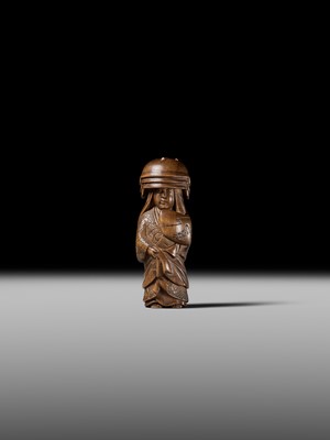 Lot 255 - HOJITSU: A FINE WOOD NETSUKE OF NABE KABURI