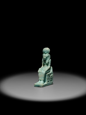 A LARGE TURQUOISE-GLAZED FAIENCE AMULET OF THE ENTHRONED SEKHMET, LATE PERIOD