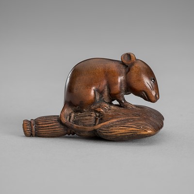 Lot 1581 - A FINE WOOD NETSUKE OF A RAT ON A BROOM