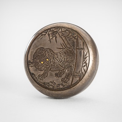 Lot 1717 - A FINE SILVERED METAL MANJU NETSUKE WITH TIGER IN BAMBOO