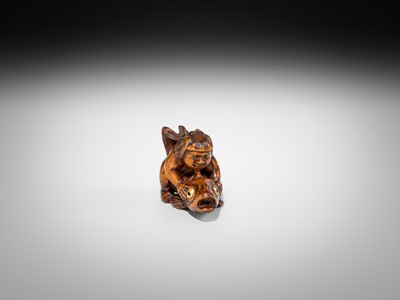 Lot 426 - AN AMUSING INLAID WOOD NETSUKE OF ONIWAKAMARU STRUGGLING WITH THE GIANT CARP