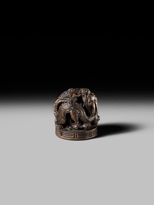 Lot 177 - A FINE OPENWORK WOOD INSHO (SEAL-TYPE) NETSUKE WITH DRAGONS