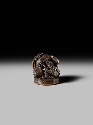 Lot 177 - A FINE OPENWORK WOOD INSHO (SEAL-TYPE) NETSUKE WITH DRAGONS