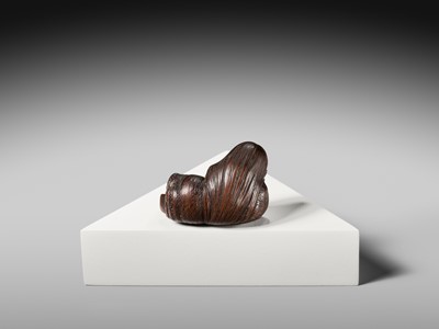 Lot 174 - ICHIUN: A WOOD NETSUKE OF A SLEEPING SHOJO