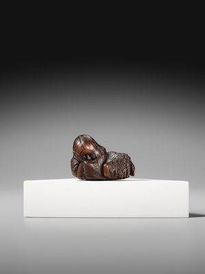 Lot 174 - ICHIUN: A WOOD NETSUKE OF A SLEEPING SHOJO