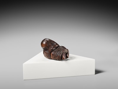 Lot 174 - ICHIUN: A WOOD NETSUKE OF A SLEEPING SHOJO