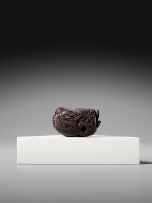 Lot 174 - ICHIUN: A WOOD NETSUKE OF A SLEEPING SHOJO