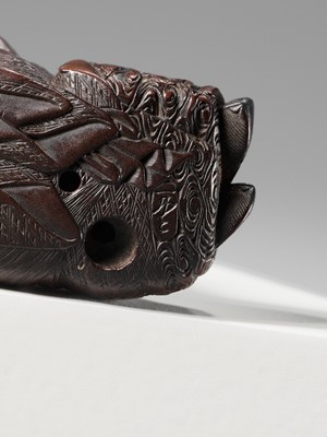 Lot 174 - ICHIUN: A WOOD NETSUKE OF A SLEEPING SHOJO