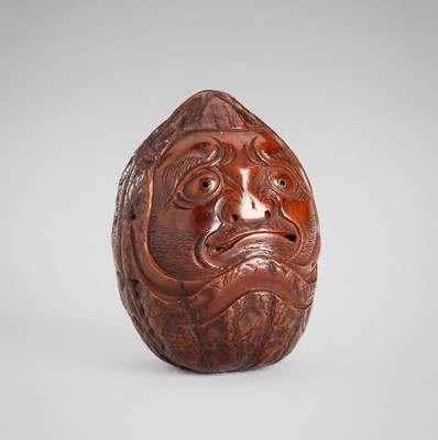 Lot 1731 - A SIGNED KURUMI (WALNUT) NETSUKE OF A ROLY POLY DARUMA