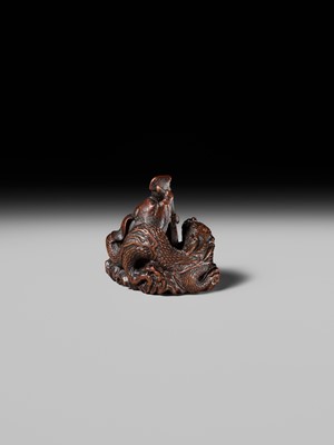 Lot 176 - MASAKAZU: A FINE NAGOYA SCHOOL WOOD NETSUKE DEPICTING TAIRA NO TSUNEMASA PLAYING THE BIWA