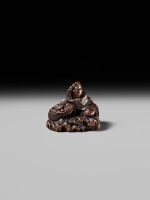 Lot 176 - MASAKAZU: A FINE NAGOYA SCHOOL WOOD NETSUKE DEPICTING TAIRA NO TSUNEMASA PLAYING THE BIWA