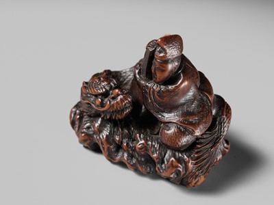 Lot 176 - MASAKAZU: A FINE NAGOYA SCHOOL WOOD NETSUKE DEPICTING TAIRA NO TSUNEMASA PLAYING THE BIWA