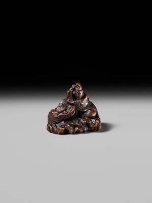 Lot 176 - MASAKAZU: A FINE NAGOYA SCHOOL WOOD NETSUKE DEPICTING TAIRA NO TSUNEMASA PLAYING THE BIWA