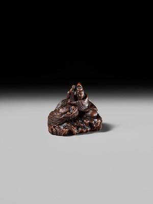 Lot 176 - MASAKAZU: A FINE NAGOYA SCHOOL WOOD NETSUKE DEPICTING TAIRA NO TSUNEMASA PLAYING THE BIWA