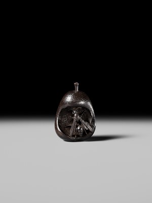 SANGETSU: A RARE EBONY WOOD NETSUKE OF A WASP IN A PEAR