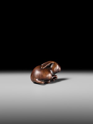 Lot 143 - MASATOMO: A RARE WOOD NETSUKE OF A HARE WITH MUSHROOM