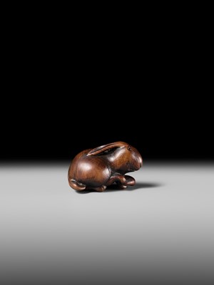 Lot 143 - MASATOMO: A RARE WOOD NETSUKE OF A HARE WITH MUSHROOM