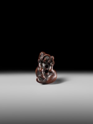 Lot 143 - MASATOMO: A RARE WOOD NETSUKE OF A HARE WITH MUSHROOM
