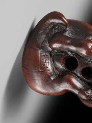 Lot 143 - MASATOMO: A RARE WOOD NETSUKE OF A HARE WITH MUSHROOM