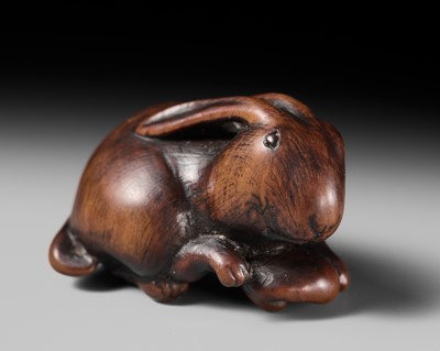 Lot 143 - MASATOMO: A RARE WOOD NETSUKE OF A HARE WITH MUSHROOM
