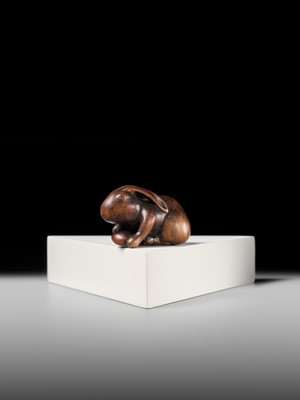 Lot 143 - MASATOMO: A RARE WOOD NETSUKE OF A HARE WITH MUSHROOM