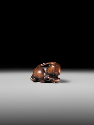 Lot 143 - MASATOMO: A RARE WOOD NETSUKE OF A HARE WITH MUSHROOM