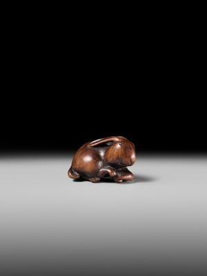 Lot 143 - MASATOMO: A RARE WOOD NETSUKE OF A HARE WITH MUSHROOM