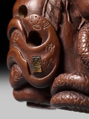 Lot 381 - HIDEYUKI KOSEI: A CONTEMPORARY WOOD NETSUKE OF SUSANOO NO MIKOTO AND THE SNAKE