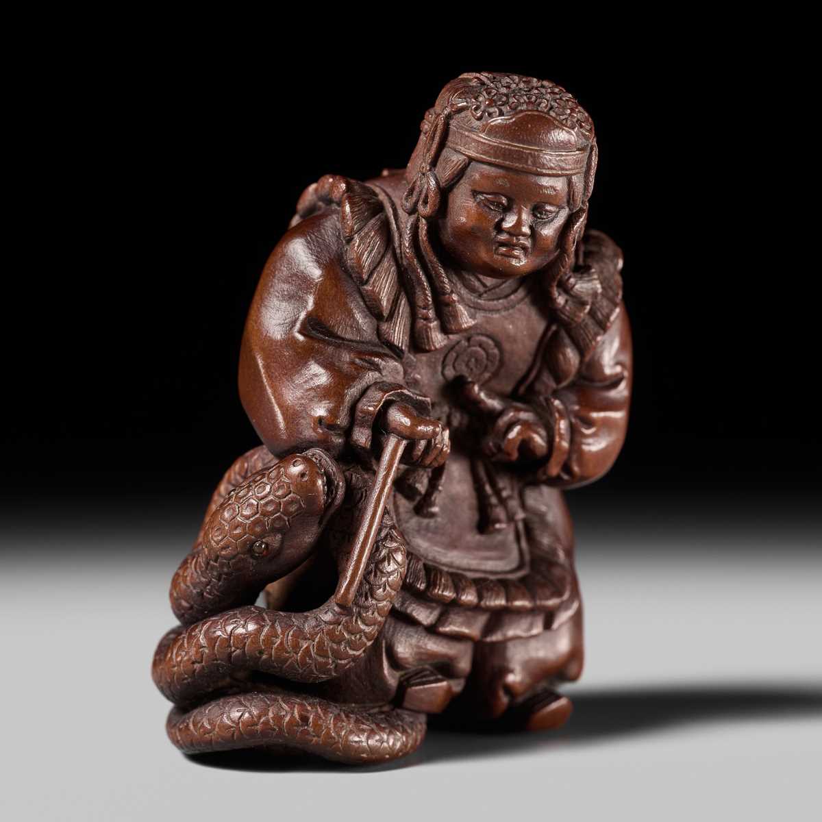 Lot 381 - HIDEYUKI KOSEI: A CONTEMPORARY WOOD NETSUKE OF SUSANOO NO MIKOTO AND THE SNAKE
