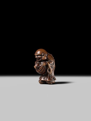 Lot 129 - AN EARLY OSAKA SCHOOL WOOD NETSUKE OF HOTEI AND A KARAKO