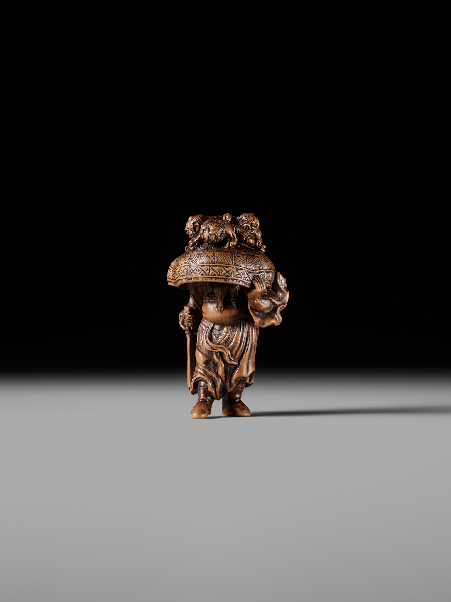 Lot 172 - A SUPERB AND LARGE WOOD NETSUKE OF SHOKI