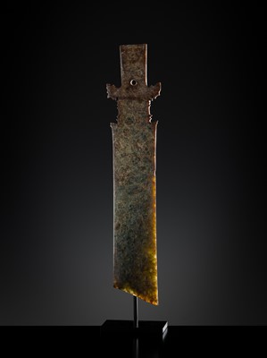 Lot 414 - A CALCIFIED CELADON JADE CEREMONIAL BLADE, ZHANG, WESTERN ZHOU DYNASTY
