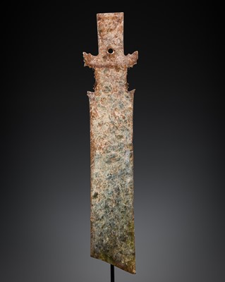 Lot 414 - A CALCIFIED CELADON JADE CEREMONIAL BLADE, ZHANG, WESTERN ZHOU DYNASTY
