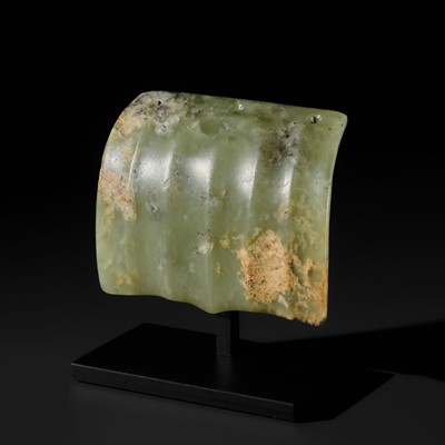 A MOTTLED GREEN JADE ORNAMENTAL ARM GUARD, NEOLITHIC PERIOD, HONGSHAN CULTURE