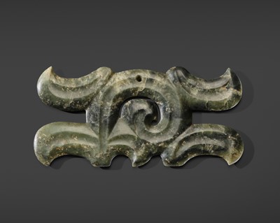 A LARGE SPINACH GREEN JADE ‘CLOUD-SCROLL’ PENDANT, NEOLITHIC PERIOD, HONGSHAN CULTURE
