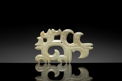 A LARGE PALE GREEN JADE ‘CLOUD-SCROLL’ PENDANT, NEOLITHIC PERIOD, HONGSHAN CULTURE