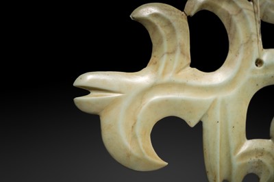 A LARGE PALE GREEN JADE ‘CLOUD-SCROLL’ PENDANT, NEOLITHIC PERIOD, HONGSHAN CULTURE