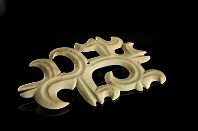 A LARGE PALE GREEN JADE ‘CLOUD-SCROLL’ PENDANT, NEOLITHIC PERIOD, HONGSHAN CULTURE