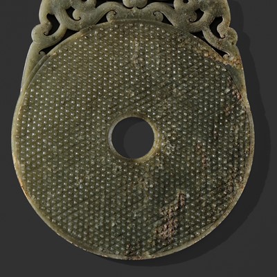 Lot 124 - AN EXCEPTIONALLY RARE AND LARGE DARK GREEN JADE ‘CHILONG’ DISK, ROYAL BI, HAN DYNASTY