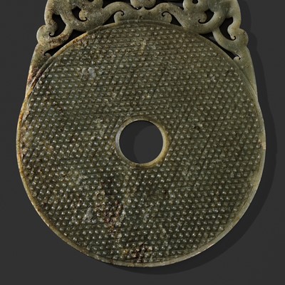 Lot 124 - AN EXCEPTIONALLY RARE AND LARGE DARK GREEN JADE ‘CHILONG’ DISK, ROYAL BI, HAN DYNASTY