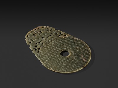 Lot 124 - AN EXCEPTIONALLY RARE AND LARGE DARK GREEN JADE ‘CHILONG’ DISK, ROYAL BI, HAN DYNASTY