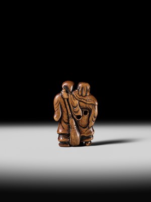 Lot 98 - AN EARLY WOOD NETSUKE OF KANZAN AND JITTOKU