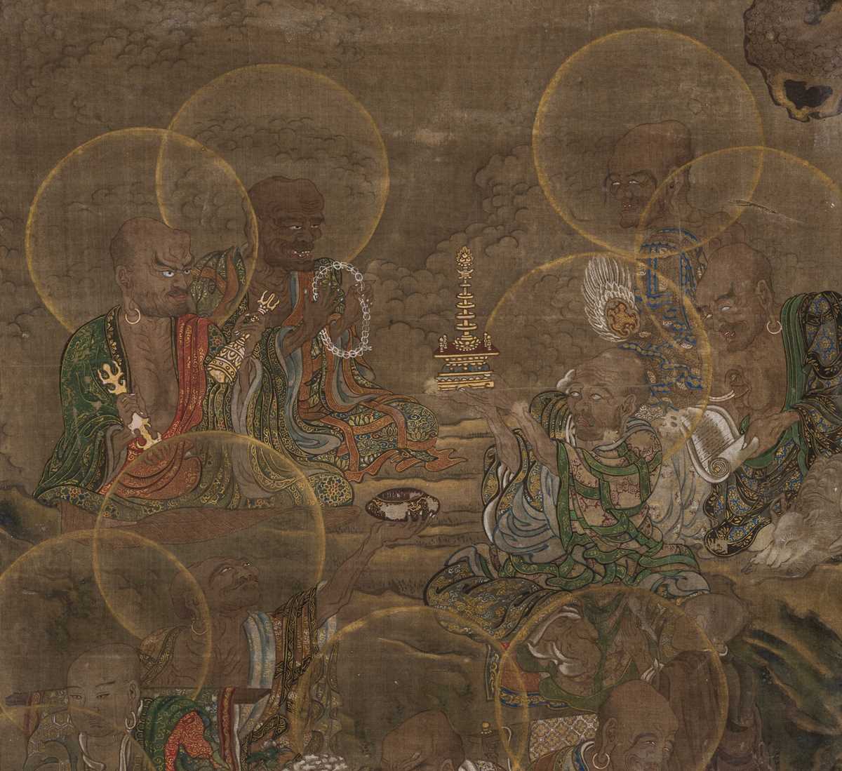 Lot 142 - A FRAGMENT OF A BUDDHIST PAINTING DEPICTING AN ASSEMBLY OF RAKAN, MUROMACHI PERIOD