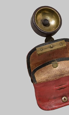 A RARE LEATHER TABAKO-IRE (TOBACCO POUCH) WITH A TANEGASHIMA TEPPO KANAMONO (POUCH CLASP)
