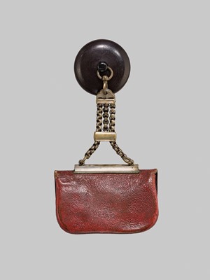 A RARE LEATHER TABAKO-IRE (TOBACCO POUCH) WITH A TANEGASHIMA TEPPO KANAMONO (POUCH CLASP)